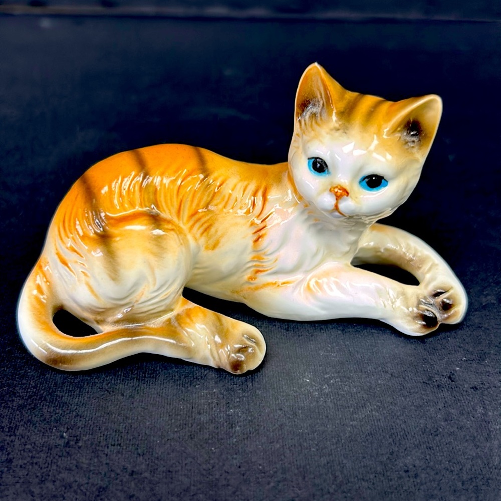 Vintage hand painted porcelain blue eyed resting striped tabby cat